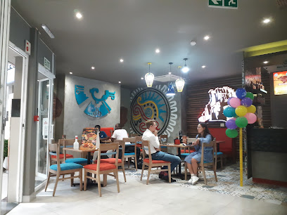 Mochachos St Peters Square dining area with mural, diners and balloons