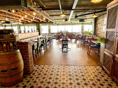 Bossa Strand Pavilion casual dining room with bar and tables