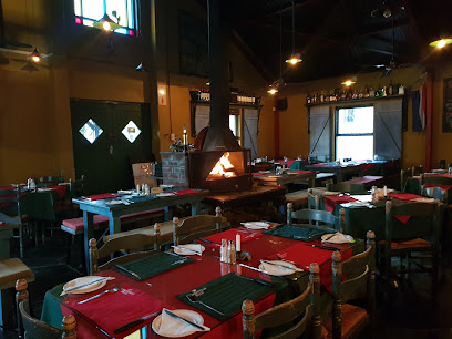 Casa Valdez dining room with central wood-fired grill