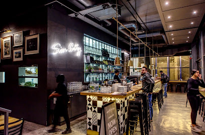 Bootlegger Harrington Street interior with long coffee bar, baristas and customers