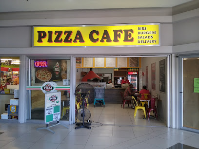Pizza Cafe storefront with yellow sign and dine-in counter
