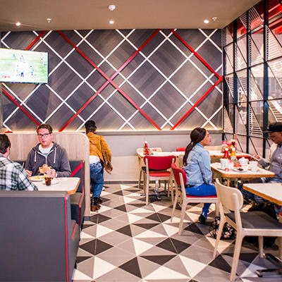 Wimpy De Ville Centre dining area with customers at booths and tables